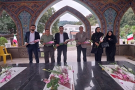 گلباران مزار شهدای گمنام لاهیجان همزمان با هفته دفاع مقدس